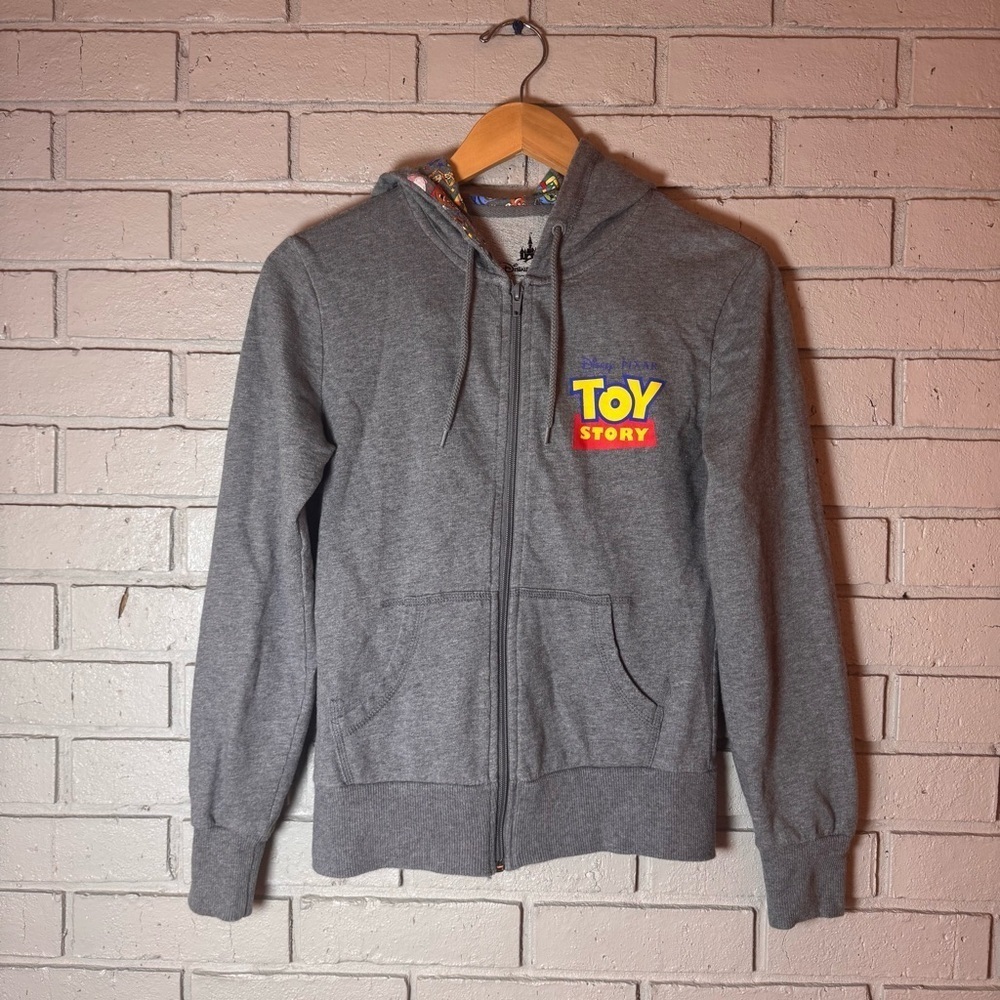 Gray size XSmall Toy Story Disney Parks  full zip sweatshirt.